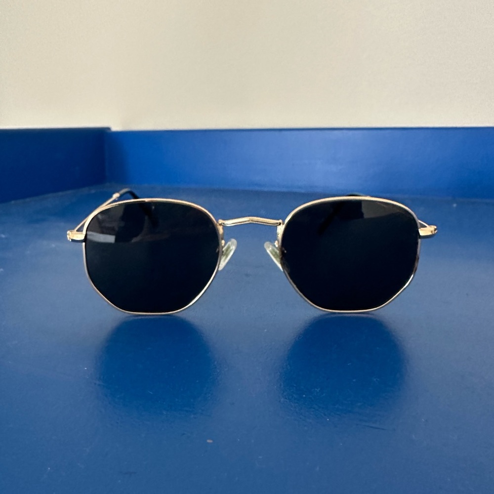Black and gold hexagon sunglasses
